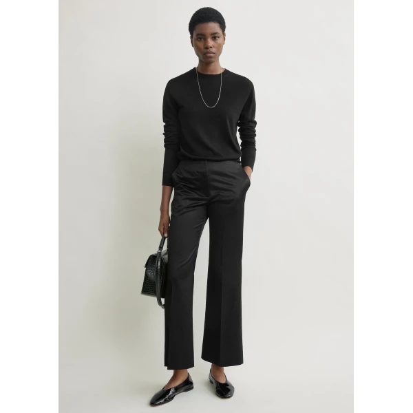 Totême Kick flare raw-edge trousers in Black - Pants - Scandinavian Minimalist Luxury at Luxury Shoes 