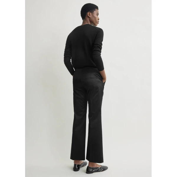 Totême Kick flare raw-edge trousers in Black - Pants - Scandinavian Minimalist Luxury at Luxury Shoes 