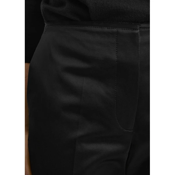 Totême Kick flare raw-edge trousers in Black - Pants - Scandinavian Minimalist Luxury at Luxury Shoes 