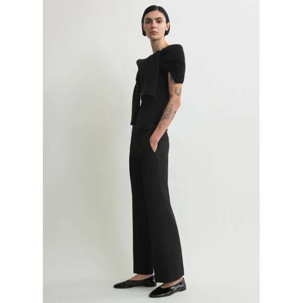 Totême Kick flare trousers in Black - Pants - Scandinavian Minimalist Luxury at Luxury Shoes 