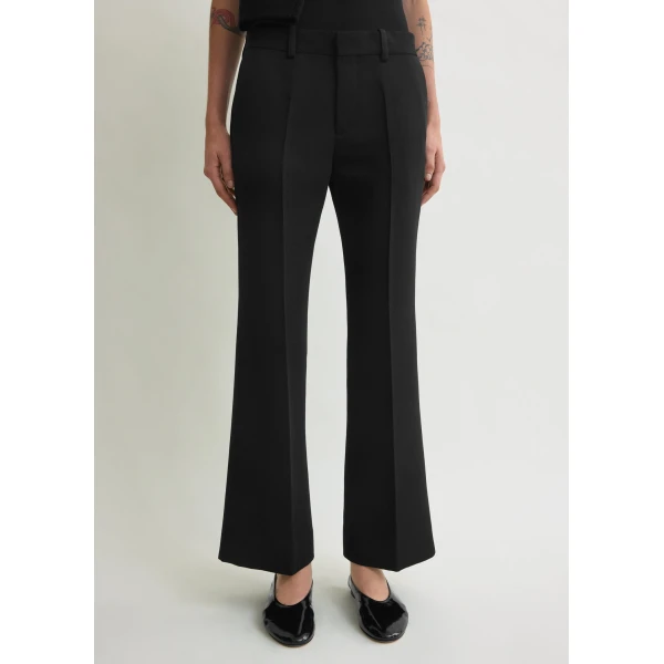 Totême Kick flare trousers in Black - Pants - Scandinavian Minimalist Luxury at Luxury Shoes 