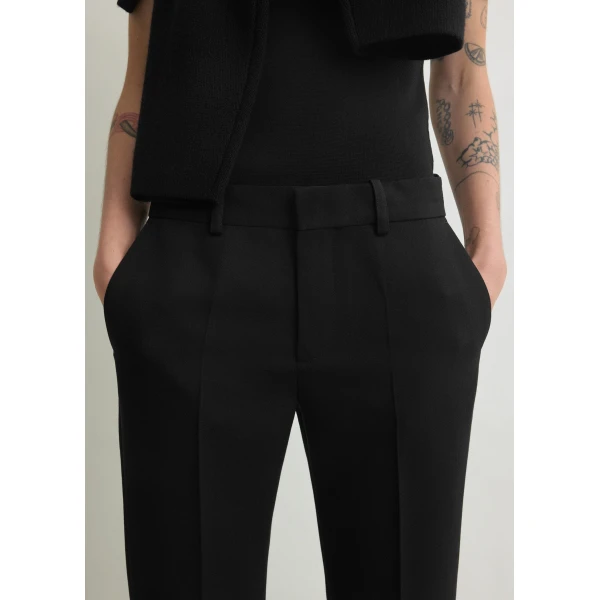 Totême Kick flare trousers in Black - Pants - Scandinavian Minimalist Luxury at Luxury Shoes 