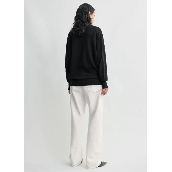 Totême Merino turtleneck in Black - Knitwear - Scandinavian Minimalist Luxury at Luxury Shoes 