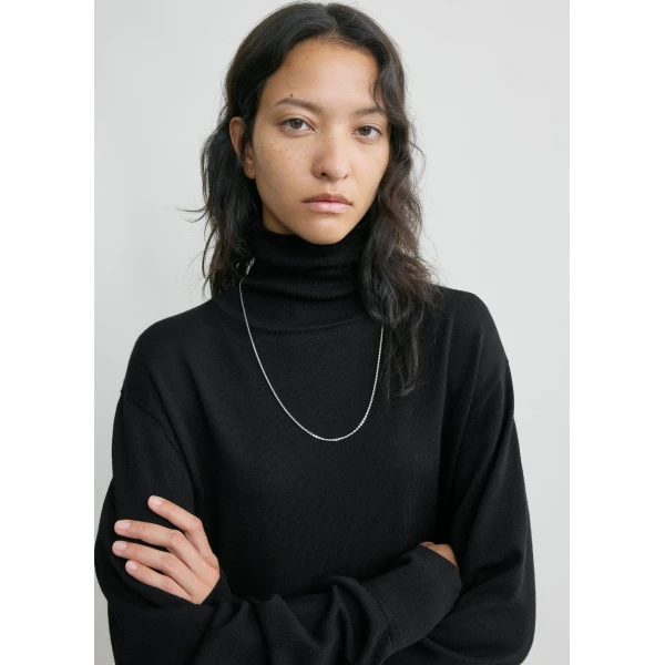 Totême Merino turtleneck in Black - Knitwear - Scandinavian Minimalist Luxury at Luxury Shoes 