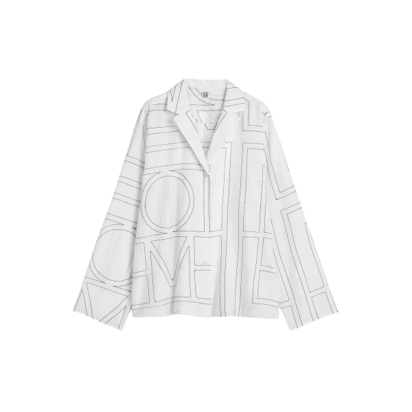 Totême Monogram cotton-blend pj top in White / Black - Tops - Scandinavian Minimalist Luxury at Luxury Shoes 