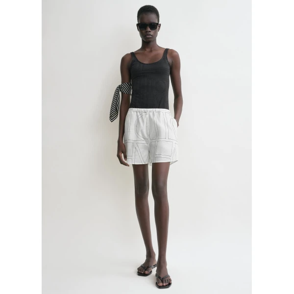 Totême Monogram cotton pj shorts in White / Black - Shorts - Scandinavian Minimalist Luxury at Luxury Shoes 