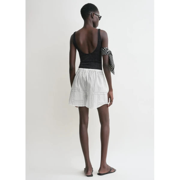 Totême Monogram cotton pj shorts in White / Black - Shorts - Scandinavian Minimalist Luxury at Luxury Shoes 