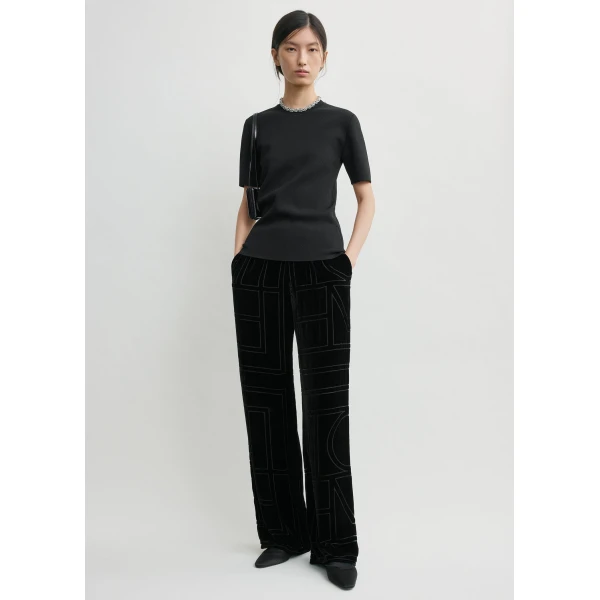 Totême Monogram devoré pj bottoms in Black - Pants - Scandinavian Minimalist Luxury at Luxury Shoes 