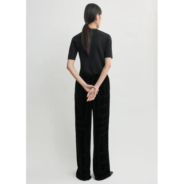 Totême Monogram devoré pj bottoms in Black - Pants - Scandinavian Minimalist Luxury at Luxury Shoes 
