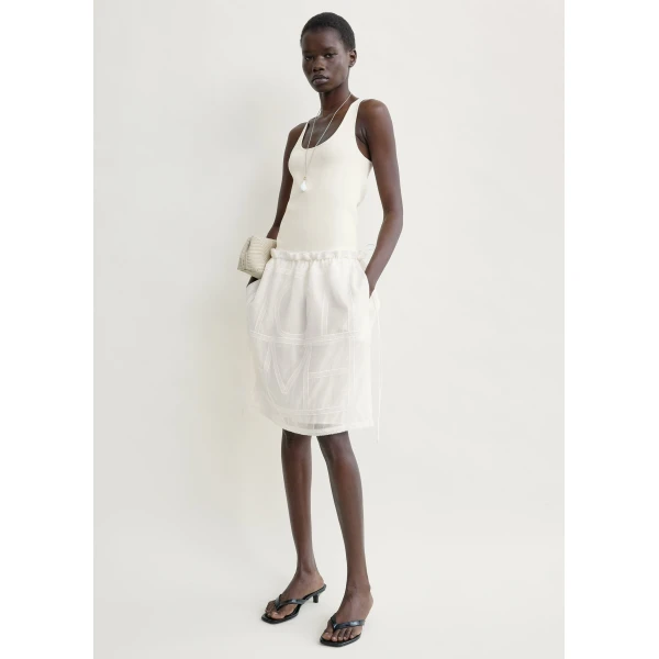 Totême Monogram mini skirt in White - Skirts - Scandinavian Minimalist Luxury at Luxury Shoes 