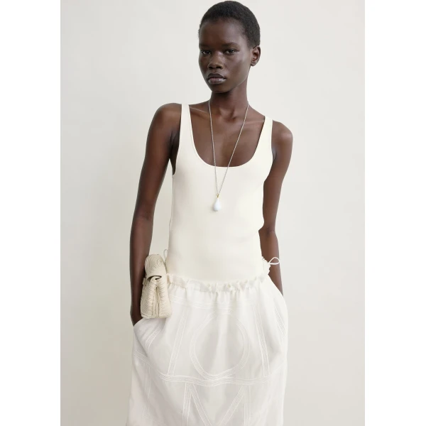 Totême Monogram mini skirt in White - Skirts - Scandinavian Minimalist Luxury at Luxury Shoes 