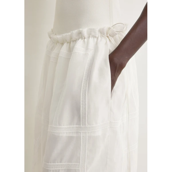 Totême Monogram mini skirt in White - Skirts - Scandinavian Minimalist Luxury at Luxury Shoes 