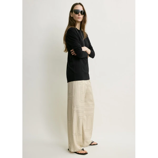 Totême Monogram silk pj bottoms ivory in Ivory monogram - Pants - Scandinavian Minimalist Luxury at Luxury Shoes 