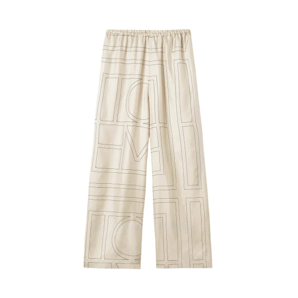Totême Monogram silk pj bottoms ivory in Ivory monogram - Pants - Scandinavian Minimalist Luxury at Luxury Shoes 