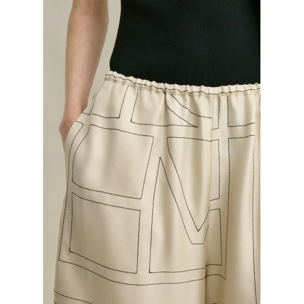 Totême Monogram silk pj culottes in Ivory - Shorts - Scandinavian Minimalist Luxury at Luxury Shoes 