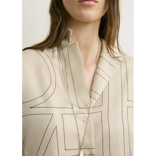 Totême Monogram silk pj top in Ivory - Tops - Scandinavian Minimalist Luxury at Luxury Shoes 