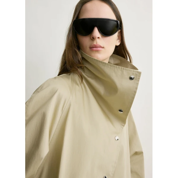 Totême Oversized cotton trench in Beige - Coats - Scandinavian Minimalist Luxury at Luxury Shoes 