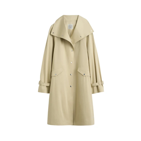 Totême Oversized cotton trench in Beige - Coats - Scandinavian Minimalist Luxury at Luxury Shoes 