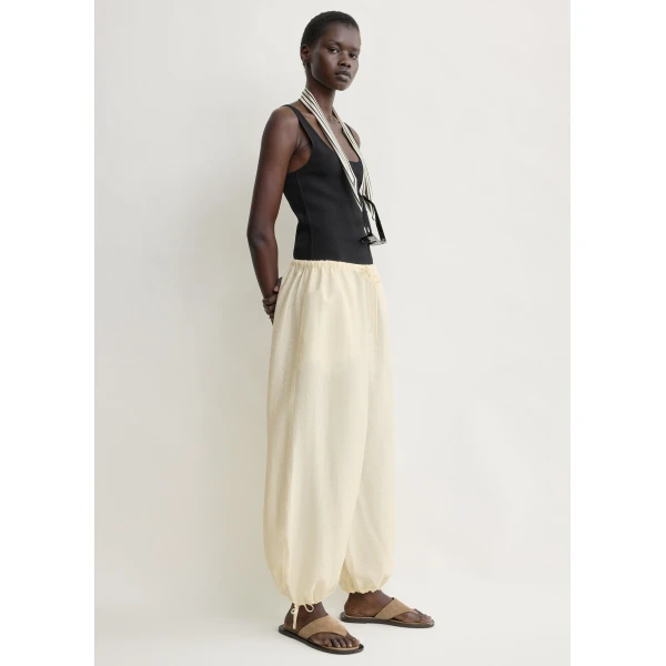 Totême Parachute trousers in Off-white - Pants - Scandinavian Minimalist Luxury at Luxury Shoes 