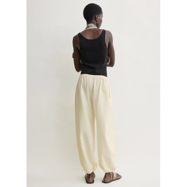 Totême Parachute trousers in Off-white - Pants - Scandinavian Minimalist Luxury at Luxury Shoes 