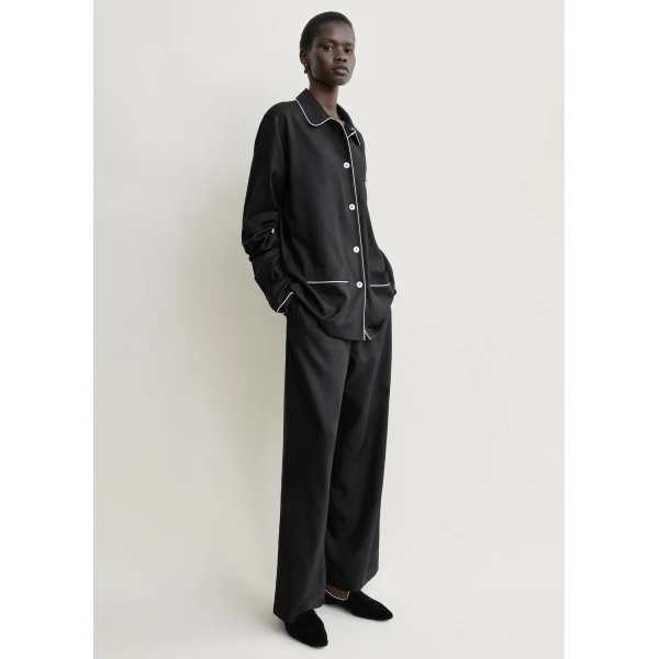 Totême Piped pj top in Black - Tops - Scandinavian Minimalist Luxury at Luxury Shoes 