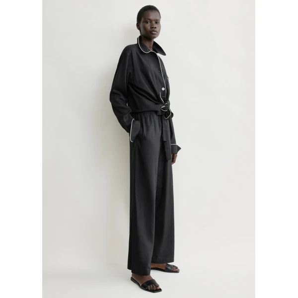 Totême Piped silk trousers in Black - Pants - Scandinavian Minimalist Luxury at Luxury Shoes 