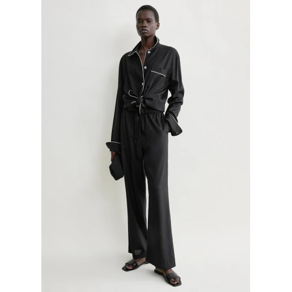 Totême Piped silk trousers in Black - Pants - Scandinavian Minimalist Luxury at Luxury Shoes 