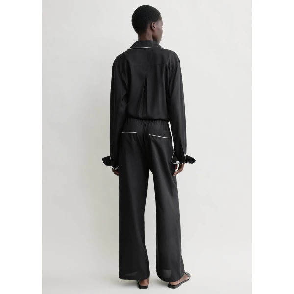 Totême Piped silk trousers in Black - Pants - Scandinavian Minimalist Luxury at Luxury Shoes 