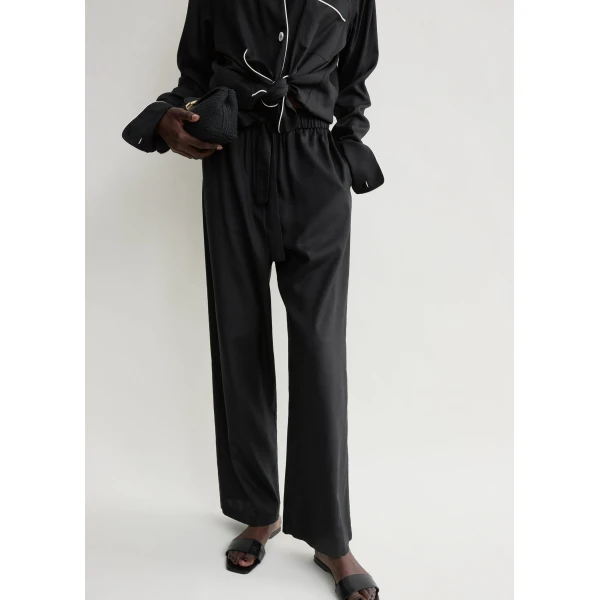 Totême Piped silk trousers in Black - Pants - Scandinavian Minimalist Luxury at Luxury Shoes 