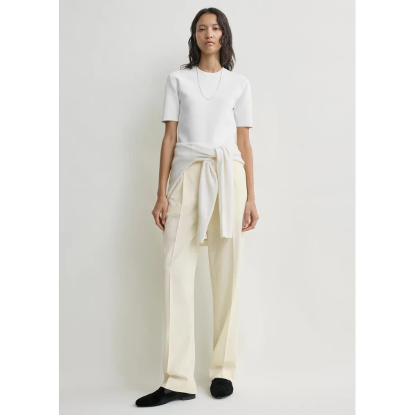 Totême Pleat trousers in Off-white - Pants - Scandinavian Minimalist Luxury at Luxury Shoes 