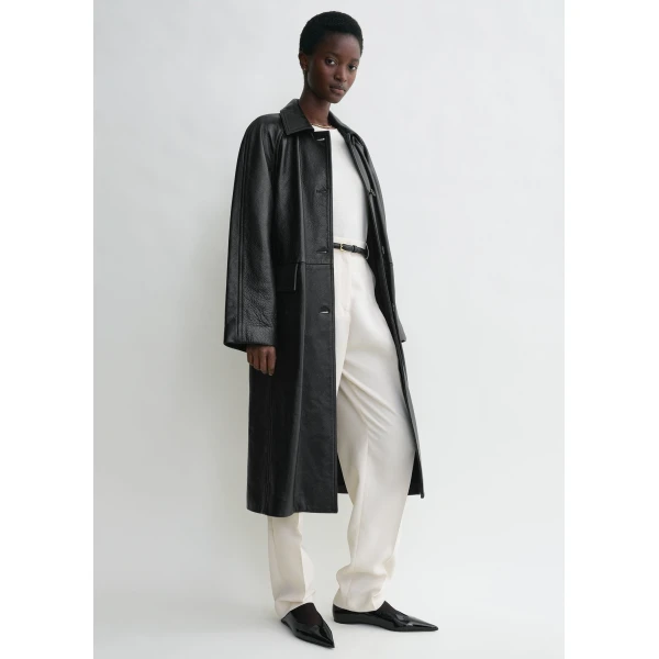 Totême Raglan-sleeve leather coat in Black - Coats - Scandinavian Minimalist Luxury at Luxury Shoes 