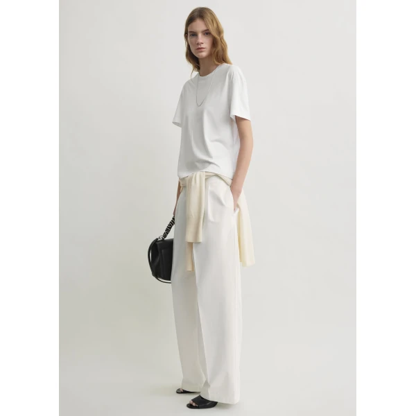Totême Relaxed chino trousers in White - Pants - Scandinavian Minimalist Luxury at Luxury Shoes 