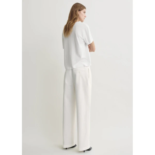 Totême Relaxed chino trousers in White - Pants - Scandinavian Minimalist Luxury at Luxury Shoes 