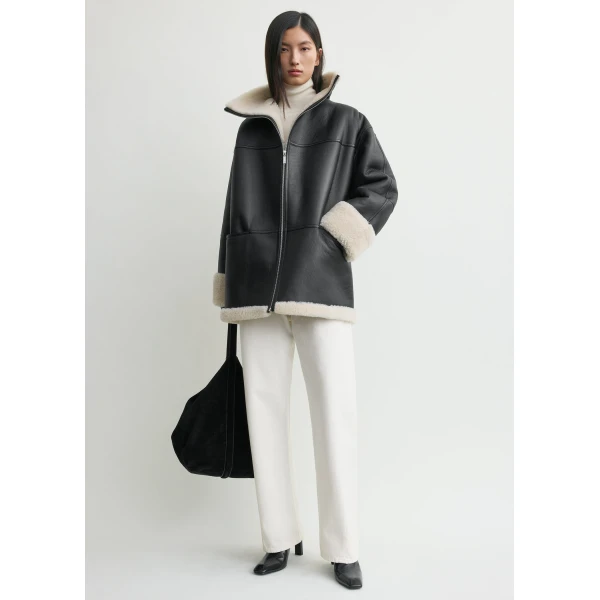 Totême Signature shearling jacket in Black / Off-white - Jackets - Scandinavian Minimalist Luxury at Luxury Shoes 