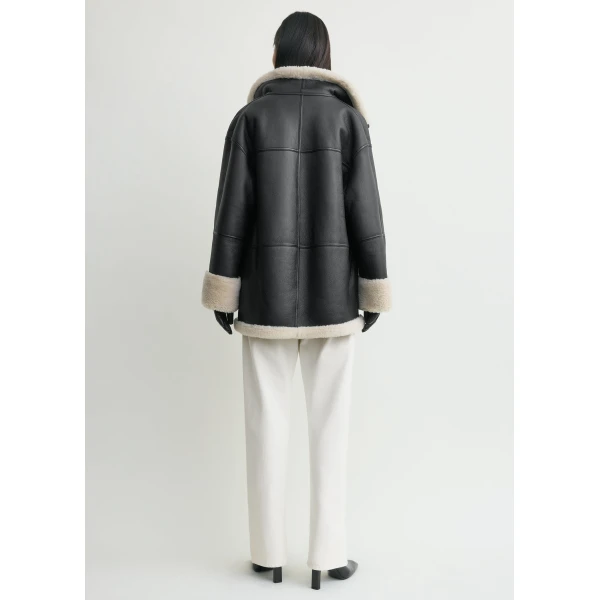 Totême Signature shearling jacket in Black / Off-white - Jackets - Scandinavian Minimalist Luxury at Luxury Shoes 