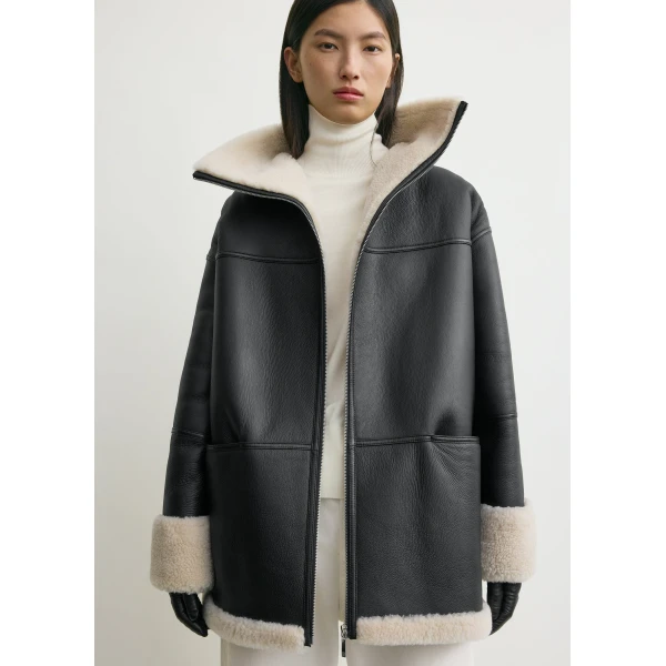 Totême Signature shearling jacket in Black / Off-white - Jackets - Scandinavian Minimalist Luxury at Luxury Shoes 