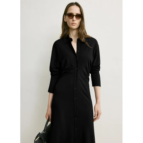 Totême Slouch jersey shirtdress in Black - Dresses - Scandinavian Minimalist Luxury at Luxury Shoes 