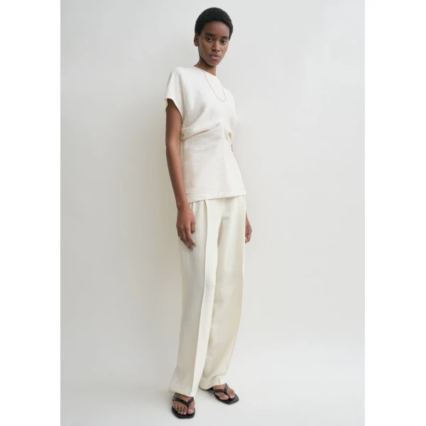 Totême Slouch waist crinkled top in Cream - Tops - Scandinavian Minimalist Luxury at Luxury Shoes 