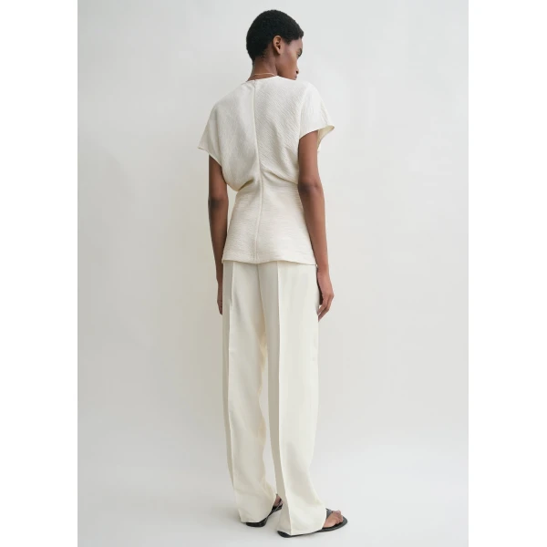 Totême Slouch waist crinkled top in Cream - Tops - Scandinavian Minimalist Luxury at Luxury Shoes 