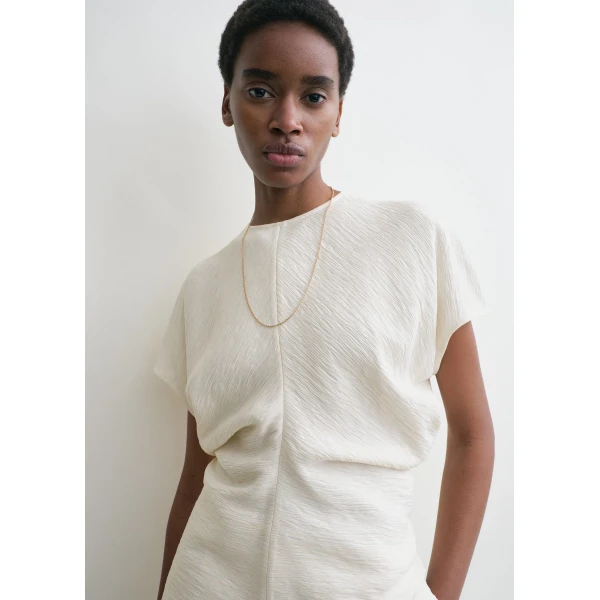 Totême Slouch waist crinkled top in Cream - Tops - Scandinavian Minimalist Luxury at Luxury Shoes 