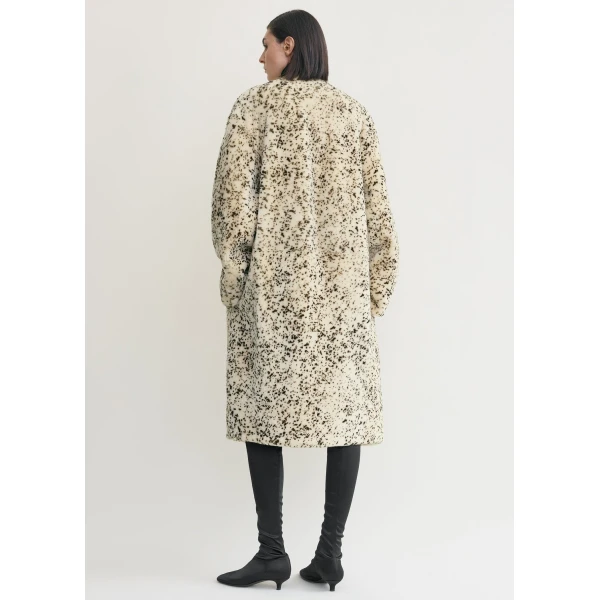 Totême Stracciatella shearling coat black/white in Black-white - Coats - Scandinavian Minimalist Luxury at Luxury Shoes 