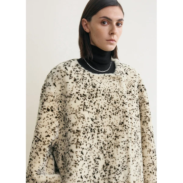 Totême Stracciatella shearling coat black/white in Black-white - Coats - Scandinavian Minimalist Luxury at Luxury Shoes 