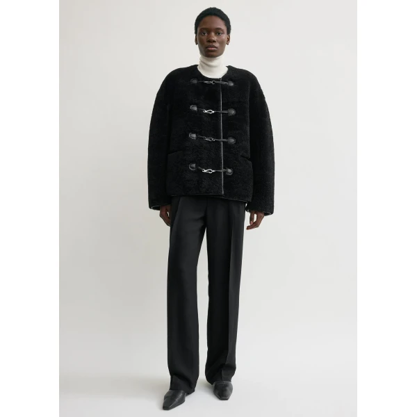 Totême Teddy shearling clasp jacket in Black - Jackets - Scandinavian Minimalist Luxury at Luxury Shoes 