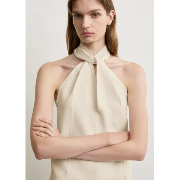 Totême Twist halter top in Ecru - Tops - Scandinavian Minimalist Luxury at Luxury Shoes 