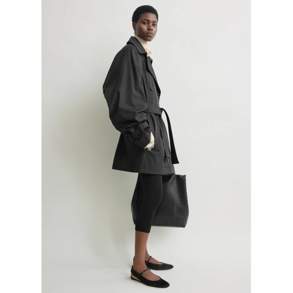 Totême Washed cotton trench in Washed black - Coats - Scandinavian Minimalist Luxury at Luxury Shoes 