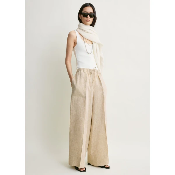 Totême Wide summer trousers in Natural - Pants - Scandinavian Minimalist Luxury at Luxury Shoes 
