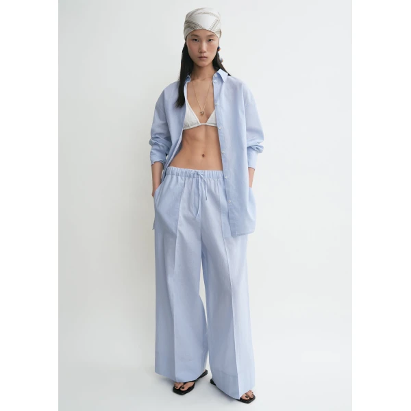 Totême Wide summer trousers in Sky - Pants - Scandinavian Minimalist Luxury at Luxury Shoes 