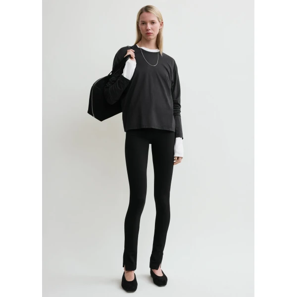 Totême Zip leggings in Black - Pants - Scandinavian Minimalist Luxury at Luxury Shoes 