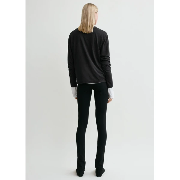 Totême Zip leggings in Black - Pants - Scandinavian Minimalist Luxury at Luxury Shoes 
