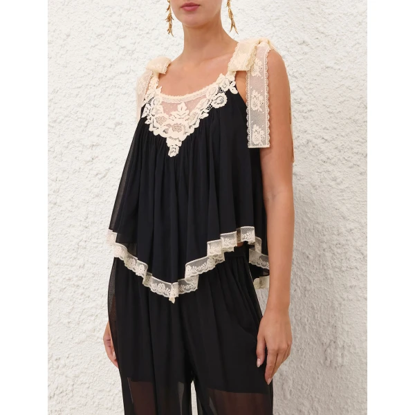 Elevate your elegance in this Zimmermann Tops available now at Luxury Shoes 